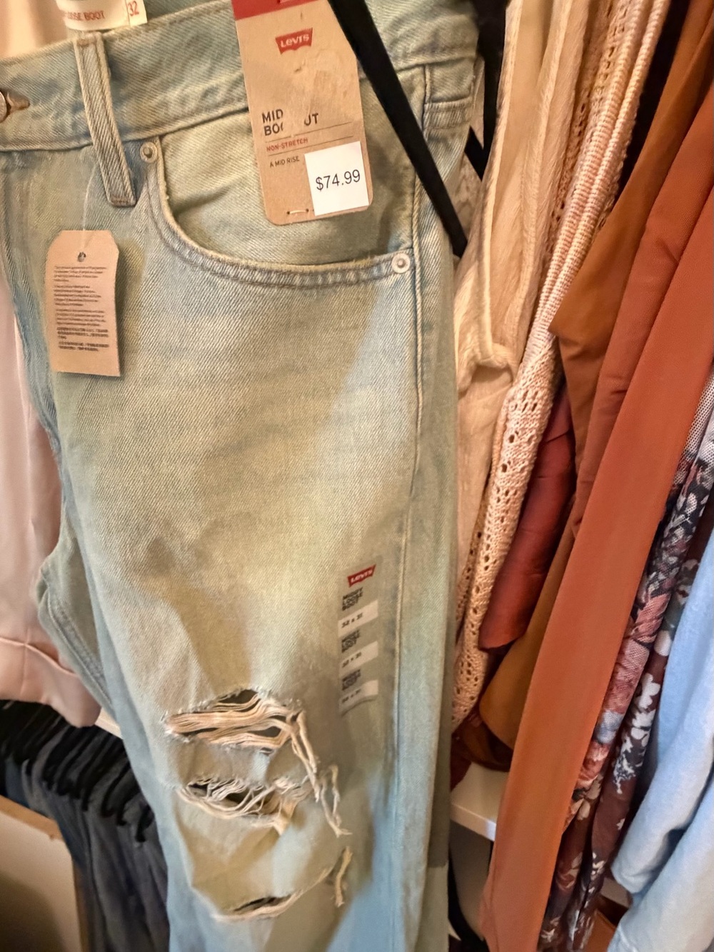 Levi's Light Blue Denim Jeans with Tan Leather Patch